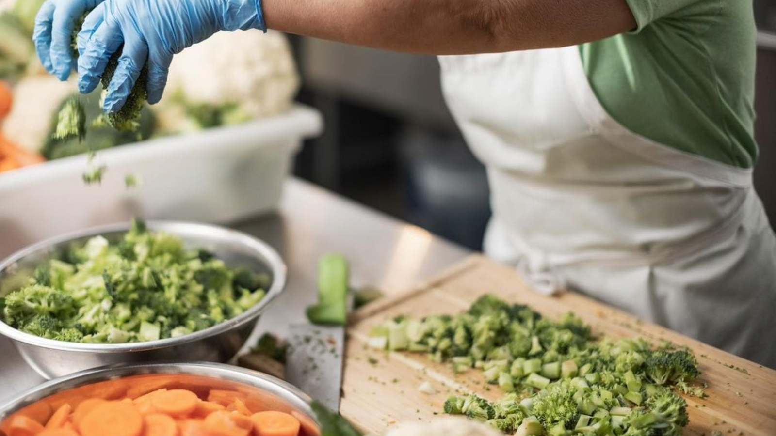 A person preparing delicious and nutritious healthy freeze dried dog food for their pets.