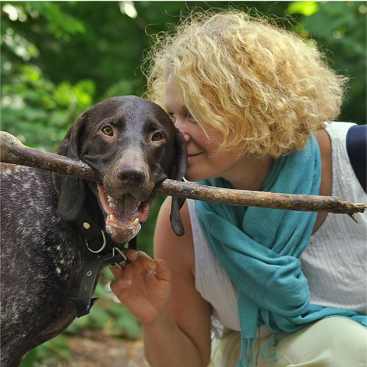 A happy dog with their Get Joy parent